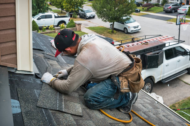 Professional Metal Roofing technician working in Yoder, CO